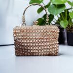 Gilded Pearl Frame Clutch